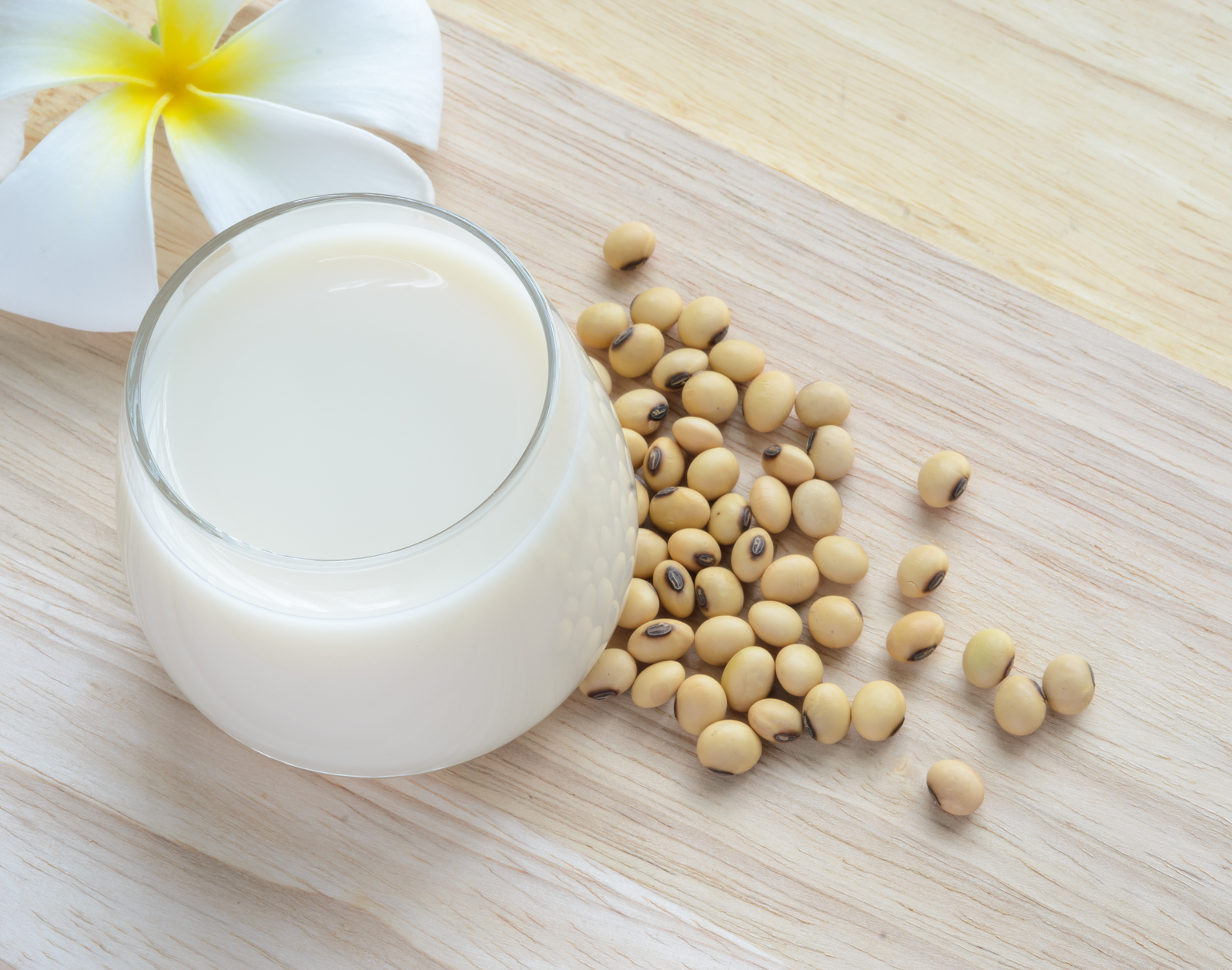 Fresh Soy Milk In A Glass And Soybean Seeds